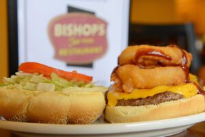 Our Business Partners - Bishops Restaurant Classic Cheeseburger Topped with Onion Rings