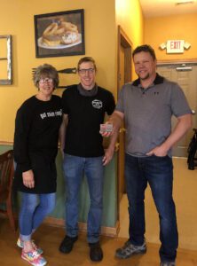 Blog - Business Spotlight - Bishop’s Fine Food Restaurant - Restaurant Owner Denise Dorsey (Left) With Son Zach Dorsey (Center) and Insurance Centre Agency Agent Aaron Dorksen